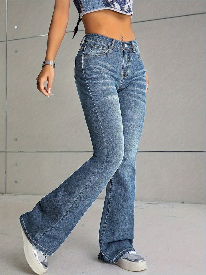 ELVANA | Elegant Washed Flare Jeans with Frayed Hem