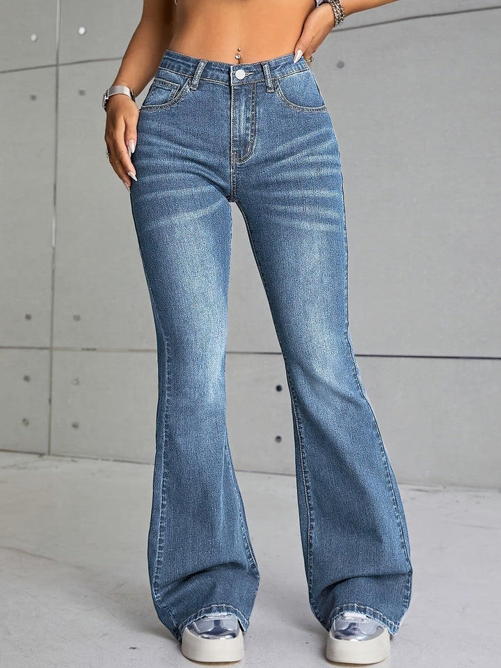 ELVANA | Elegant Washed Flare Jeans with Frayed Hem